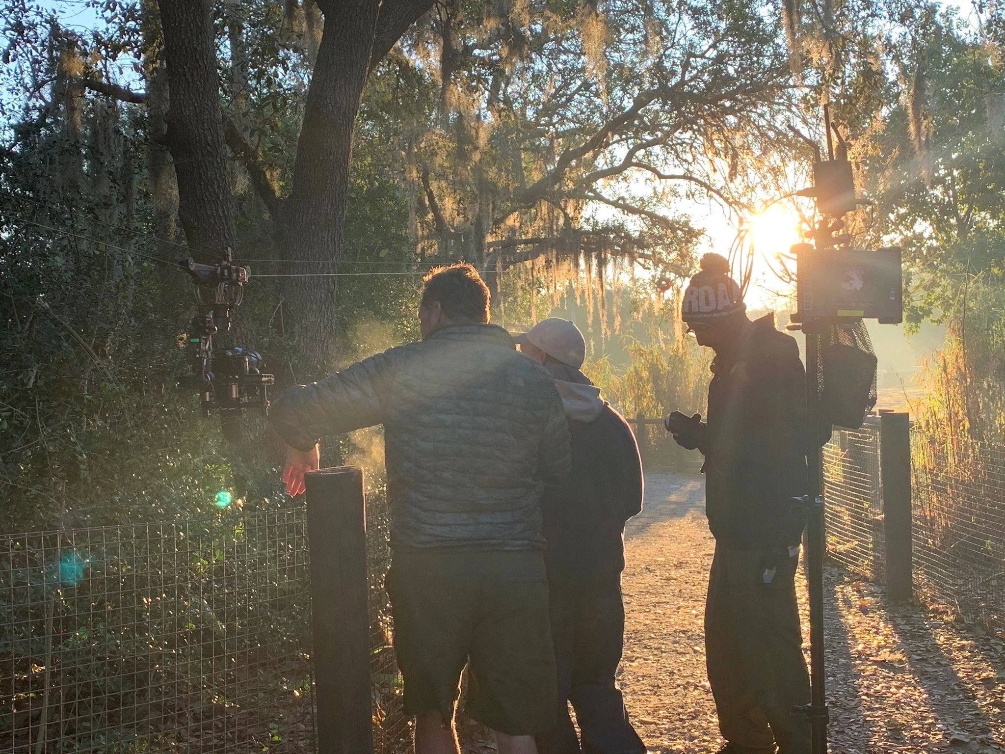 Film crew working on location in the early morning light