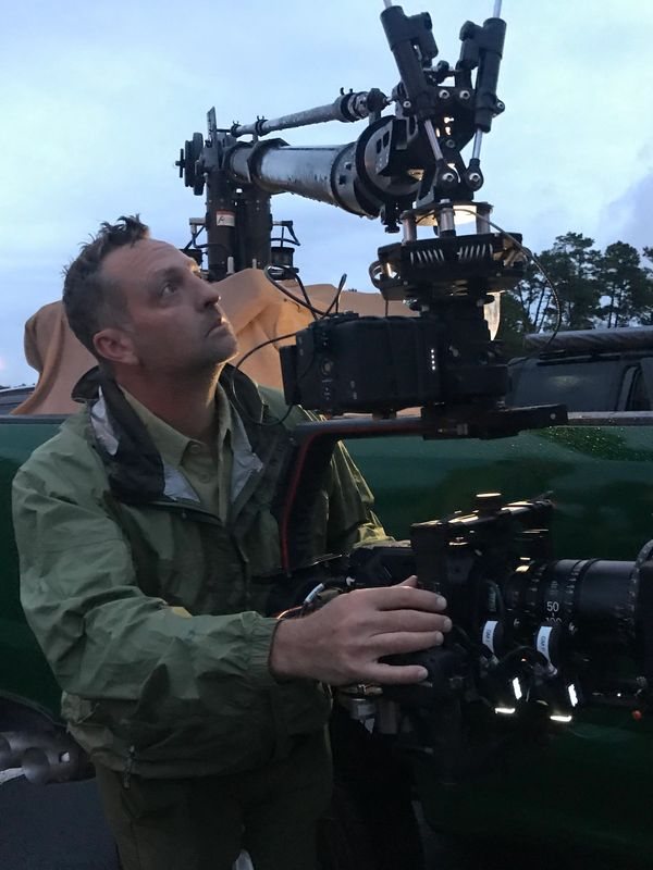 Jeff Stitzel operating a cinema camera rig on location